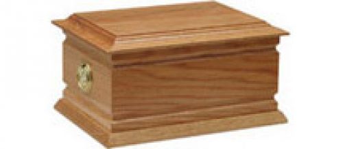Click Here To Enlarge This Photo Of D. Solid oak casket with routed sides and end rings
